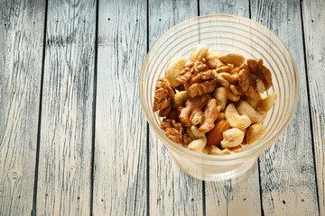 Glass bowl of mixed nuts