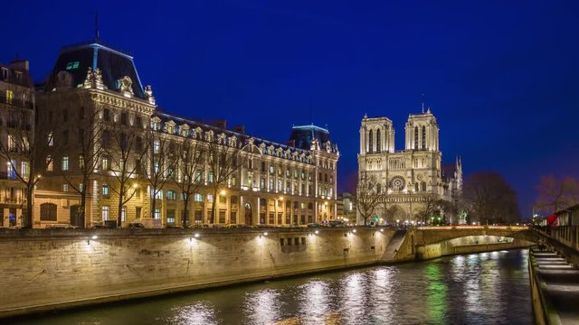 notre-dame de paris cathedral night seine river city island panorama 4k time lapse france

