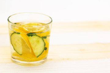 water with lemon and cucumber. copy space