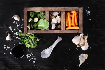 Raw salmon fillets with greens