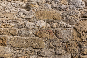 close up of weathered stone wall
