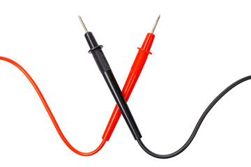 Crossed red and black multimeter probes isolated on white background