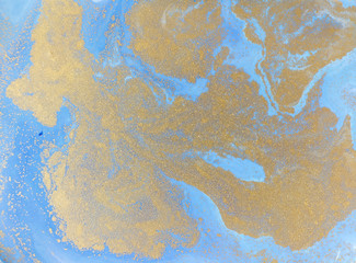 Blue and golden liquid texture. Watercolor hand drawn marbling illustration. Ink marble background.