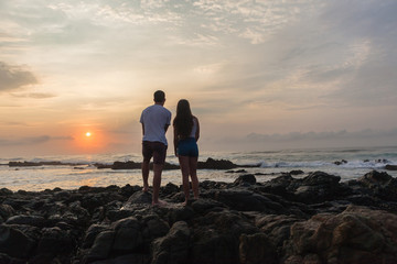 Girl Boy Beach Ocean Silhouetted Sunrise Landscape