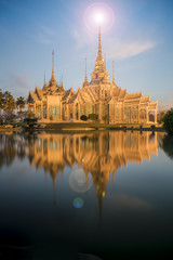 Fototapeta premium 19April2017,Thailand temple Wat bungkum on sunset with lens flare and top of temple:Nakorn ratchasima,Thailand