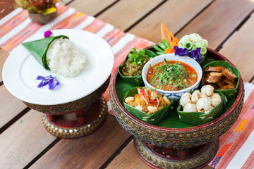 northern traditional thai food set consist of crispy pork,tomato paste, mix vegetable,mince pork, chilli paste, sausage
