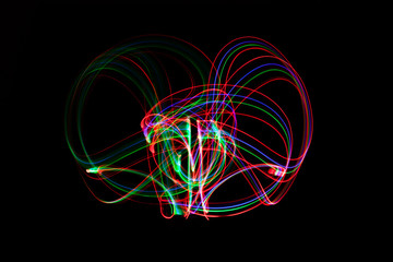 abstract neon light painting on black background.