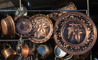 Copper cookware on market in Italy.