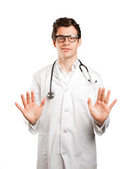 Satisfied doctor with keep calm gesture against white background