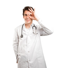 Concentrated doctor searching against white background