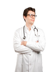 Fototapeta premium Satisfied doctor looking against white background