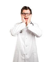 Surprised doctor against white background