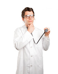 Doctor using a stethoscope against white background