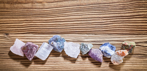 Assortment of crystal healing stones in a banner