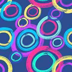 Modern hand drawn neon glow background with irregular structure of repeating colorful circles on the dark blue background. Vector seamless pattern.