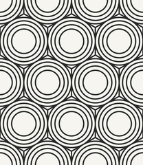 Modern stylish monochrome geometric background with repeating structure of outlined circles. Perfect for prints, wallpapers and fabrics. Vector seamless pattern. - 145007470