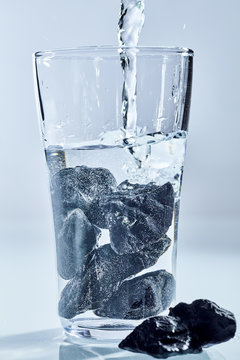 Shungite stones being used to purify water