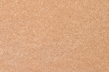 Brown plywood surface.