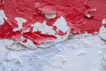 chipped paint on an old plaster wall, texture background