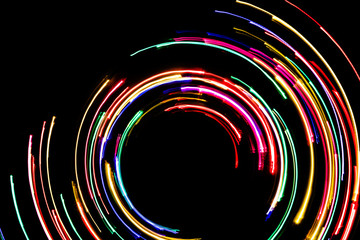 Colorful neon rotating lights glowing background.