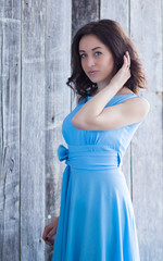 Beautiful girl in a blue dress, spring