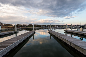 Fototapeta na wymiar Hemingway Pier Next to the Bay Bridge outside of Annapolis Maryland at Sunset