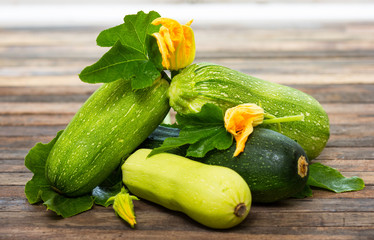 Fresh zucchini on the wooden table 