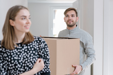 Young couple moving into an apartment together