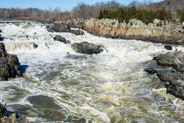rushing white water in great falls park, virginia side in winter