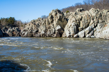 rushing white water in great falls park, virginia side in winter