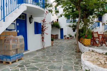After rain on island of Folegandros/Spring in Cyclades Islands there are rain. Typical architecture in white and blue tones, design of wood, stone and slabs. From a trip to Mediterranean 