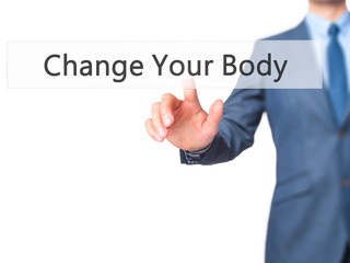 Change Your Body - Businessman hand pressing button on touch screen interface.
