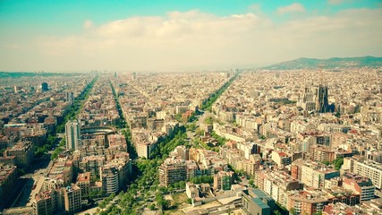 Barcelona city aerial view on a sunny day, Spain. Famous Sagrada Familia - Basilica and Expiatory Church of the Holy Family