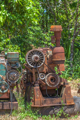 Old machinery rusted up.after the mine.After the mining industry was completed, the mining equipment was left rusty.