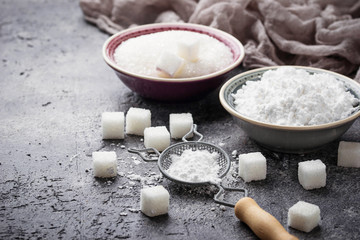 Sugar and powder on concrete background