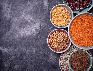 Various legumes. Chickpeas, red lentils, black lentils, yellow peas and beans