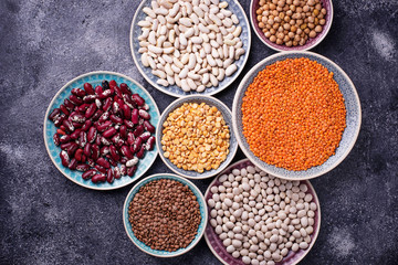 Various legumes. Chickpeas, red lentils, black lentils, yellow peas and beans