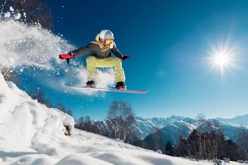 Fotobehang Girl is jumping with snowboard © Аrtranq