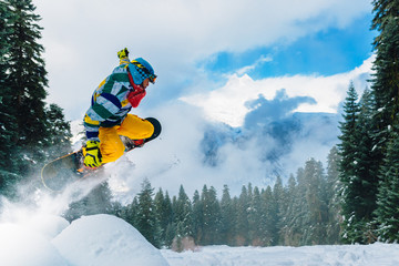 snowboarder is jumping very high