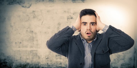 young business man with expression of surprise