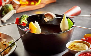 Healthy vegetable fondue with fresh produce