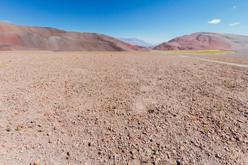 Red hills with steppe rocks in Catamarca, Argentina