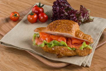 Bruschetta with fish salmon, vegetables, tomato, and sauce. Homemade fast food recipe dishes. 