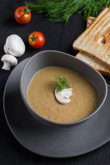 Soup with mushrooms and bread crumbs. 
