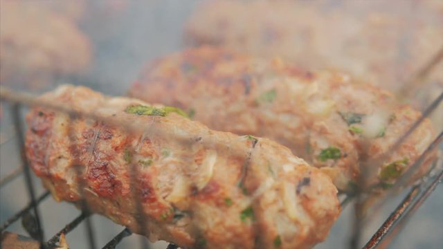 Barbecue grilling shish kebab. Clos up view. 4k