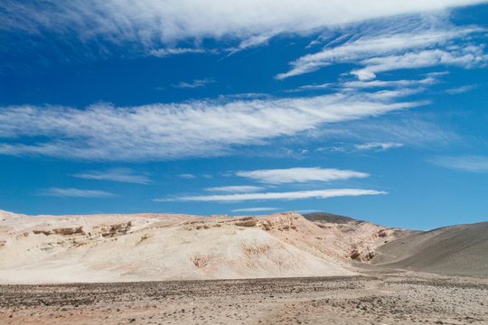Gray dirt hills in deserted steppe in the Andes in Catamarca, Argentina