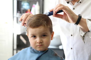 child haircut in the barbershop