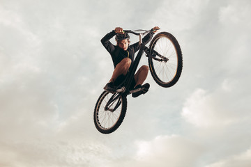 The sportsman flying on trial bike