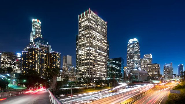 Downtown Los Angeles and freeway traffic at dusk, time lapse.
