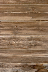 Fototapeta na wymiar Old wood planks background. Vintage colored abandoned fence planks backdrop.